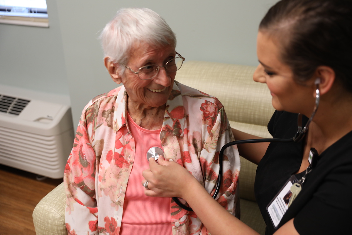Caregiver Listening to Senior Woman's Heart_Uplands Village