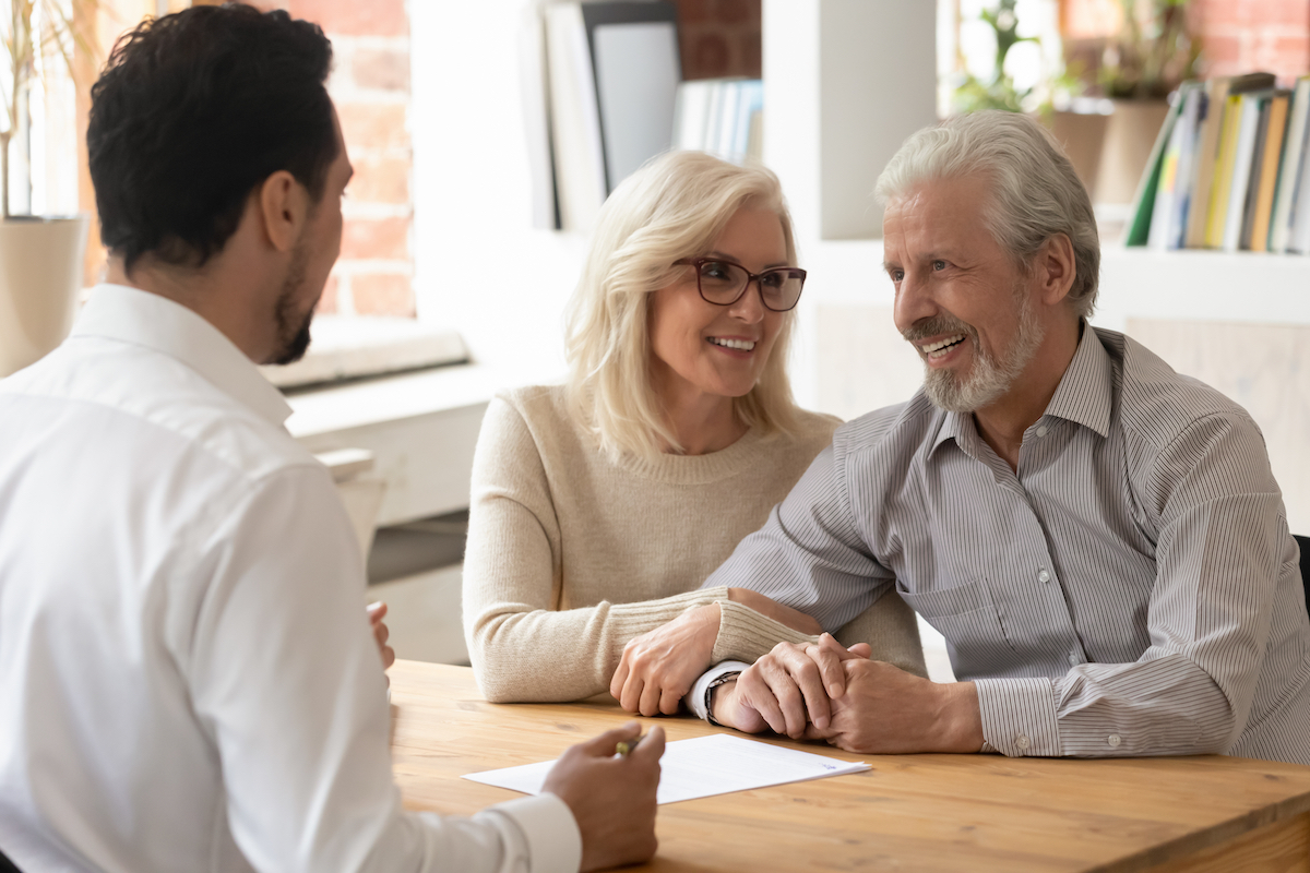 Senior Couple Seeking Advise from Financial Advisor_Uplands Village